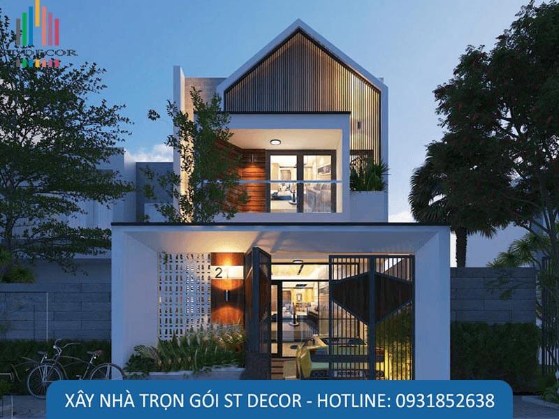 Mẫu nhà có thiết kế mới lạ, điểm nhấn là phần mái được thiết kế bằng khung sắt chắc chắn, bên hông có nhiều tiểu cảnh giúp ngôi nhà thoáng mát hơn