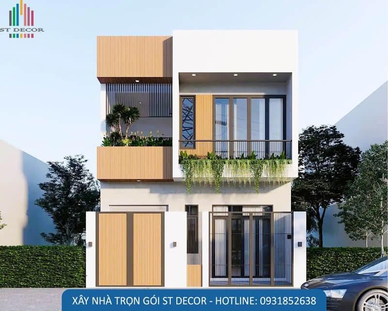 Mẫu nhà 1 trệt 1 lầu 6x20m với 2 tông màu trắng và vàng kết hợp hài hòa, đặc biệt bên hông ngôi nhà có phần ban công rộng dùng để trồng nhiều loại cây xanh