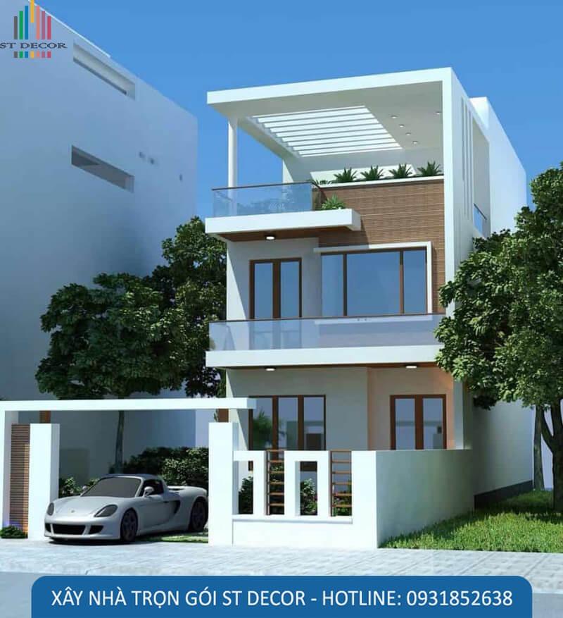 Mẫu nhà 1 trệt 1 lầu 6x20m với gam màu trắng làm chủ đạo, cửa được làm bằng kính cao cấp, khu vườn bên hông nhà có diện tích lớn, trồng nhiều cây xanh