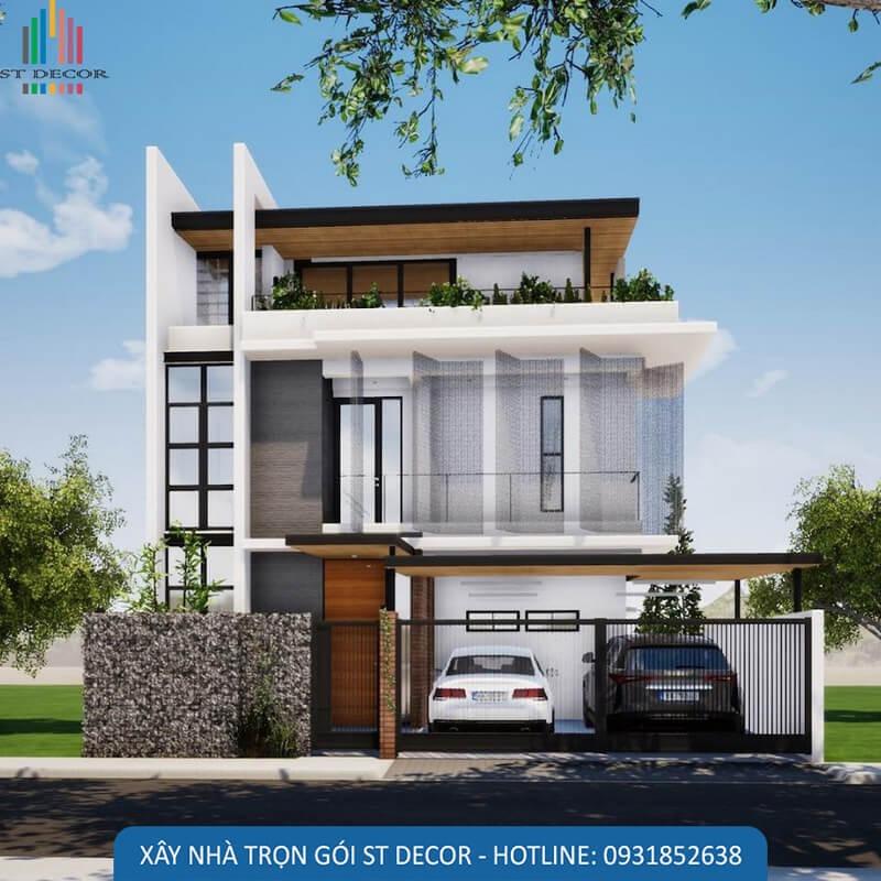 Mẫu nhà được thiết kế với 2 cổng, cổng lớn dành cho xe ô tô, công còn lại dành cho người đi vào, điểm nhấn của ngôi nhà là bức tường hoa nhiều màu sắc